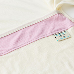Cream merino baby wrap with pink detail