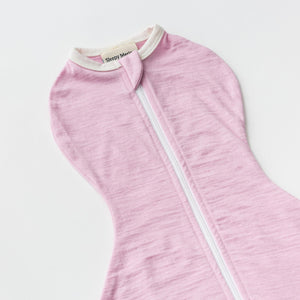 close up of merino zipper swaddle pod in pink